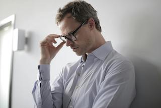 Man struggling with work related anxiety